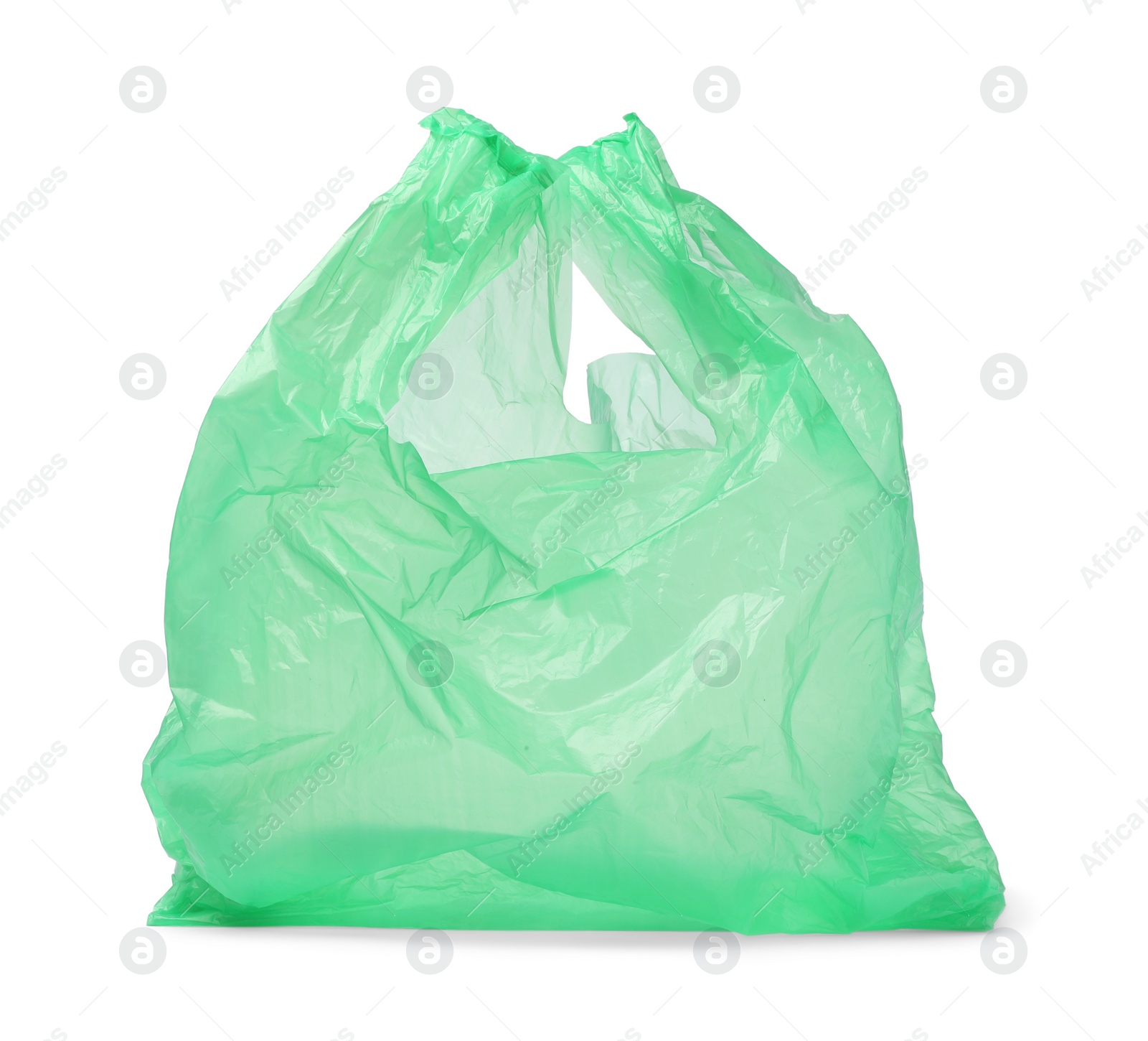 Photo of One green plastic bag isolated on white