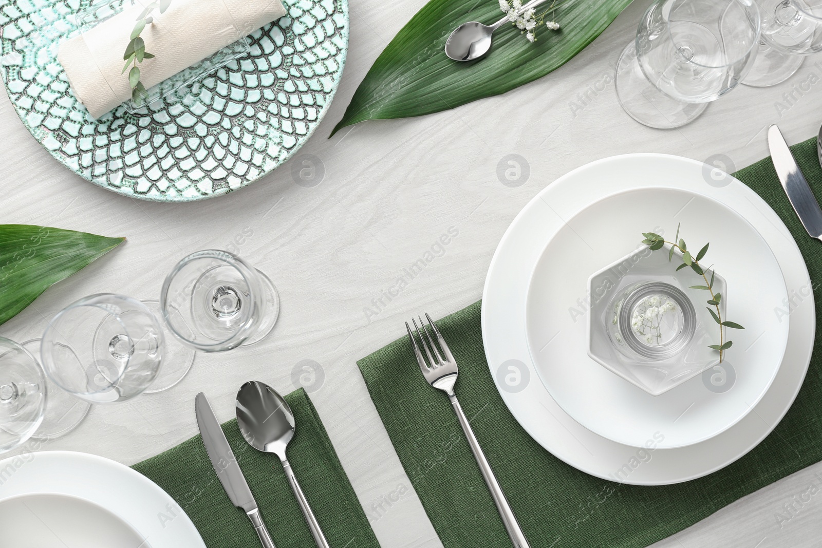 Photo of Elegant festive setting on white wooden table, flat lay