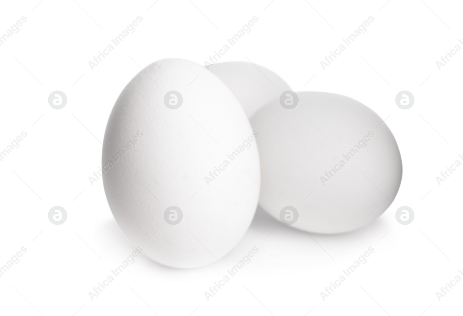 Photo of Fresh raw chicken eggs isolated on white