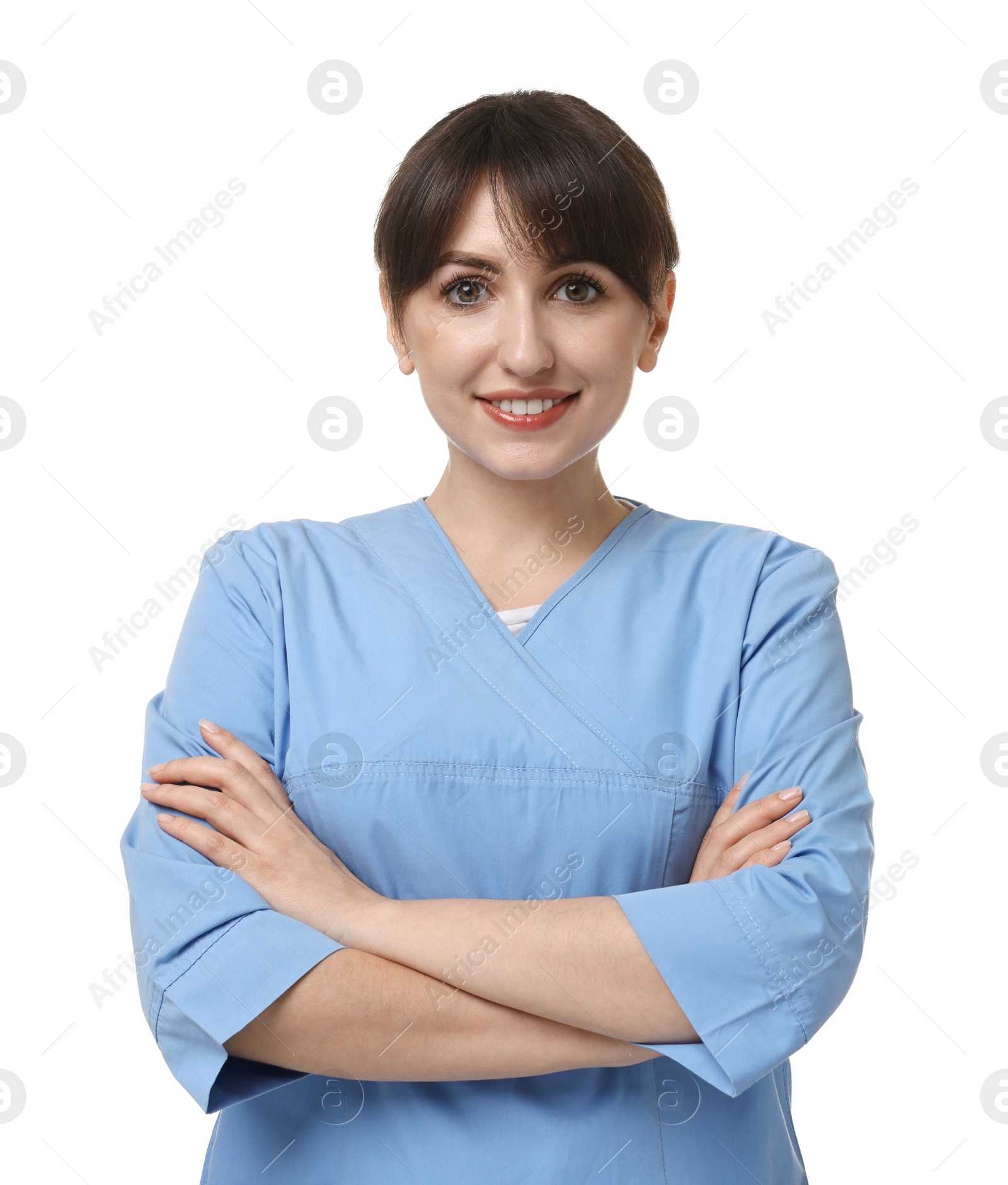 Photo of Portrait of smiling medical assistant with crossed arms on white background