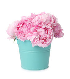 Photo of Beautiful peonies in bucket isolated on white