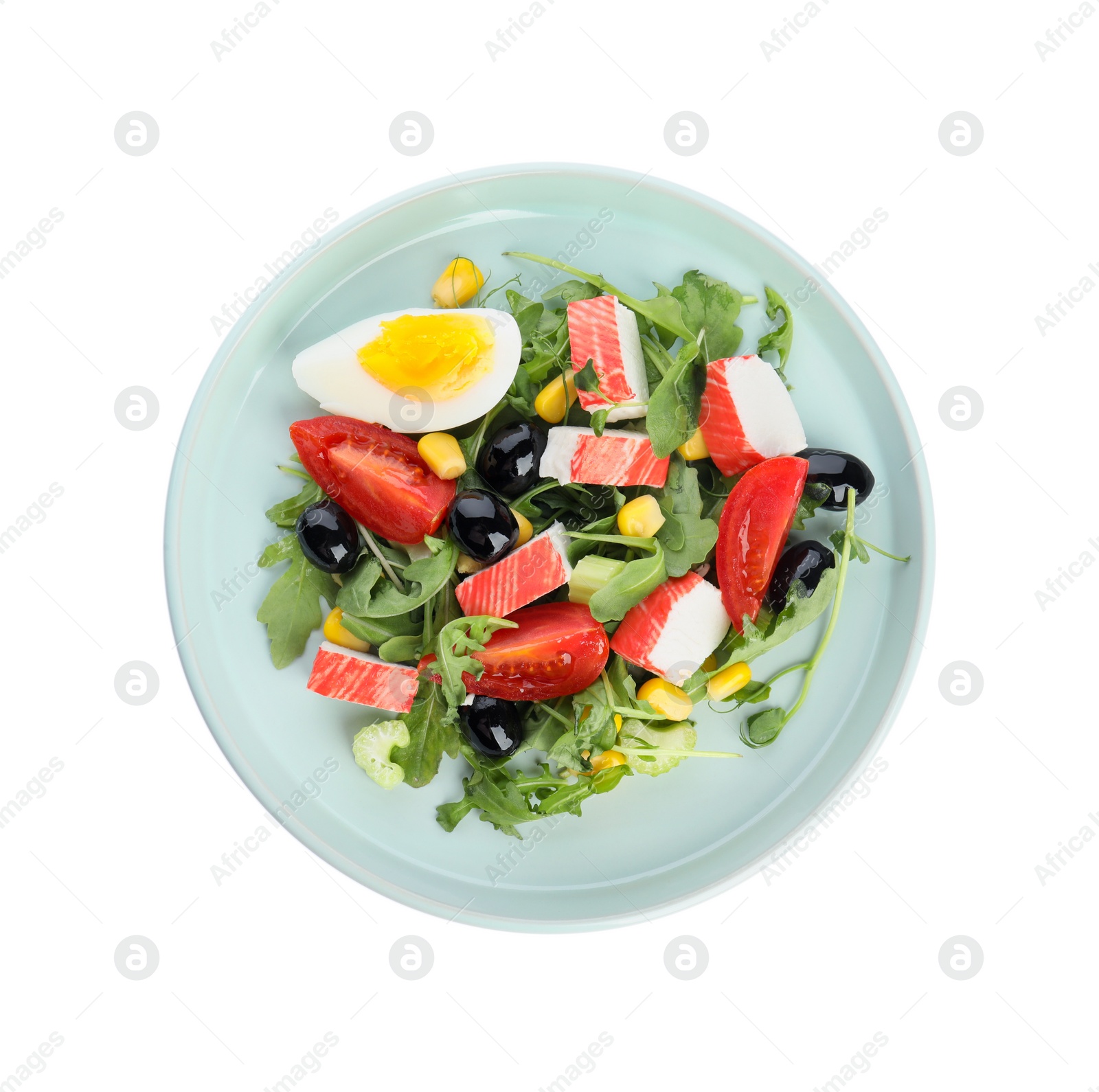 Photo of Tasty crab stick salad isolated on white, top view