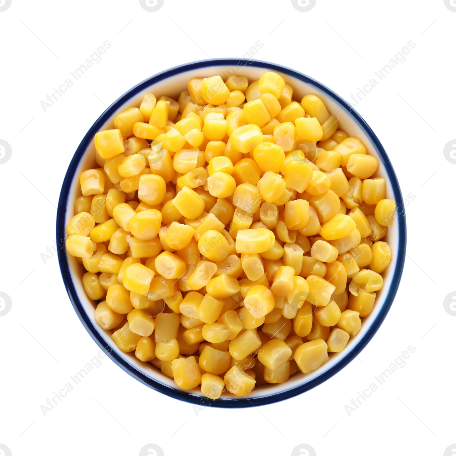 Photo of Delicious canned corn in bowl isolated on white, top view