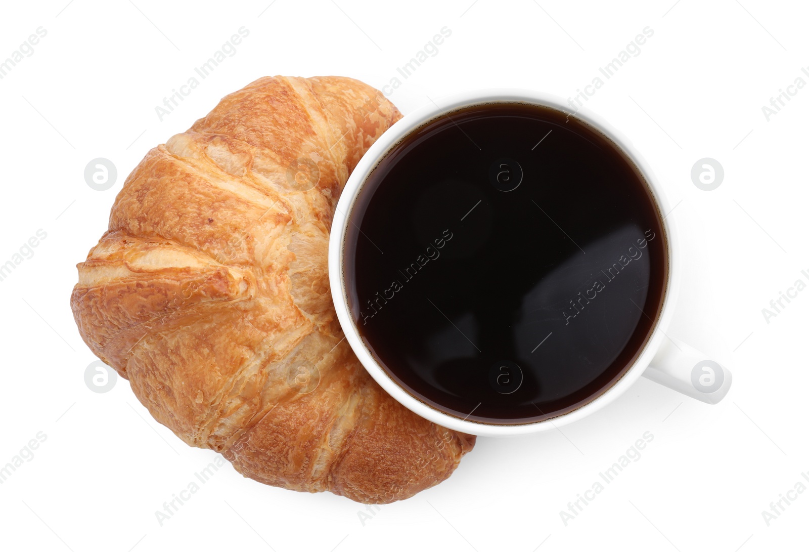 Photo of Fresh croissant and coffee isolated on white, top view. Tasty breakfast