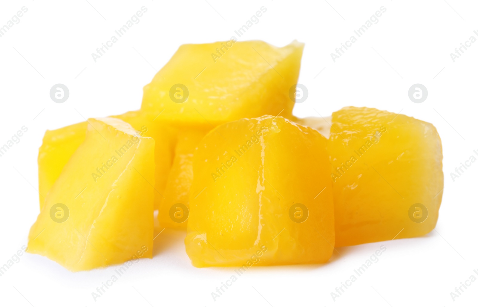 Photo of Fresh juicy mango cubes on white background