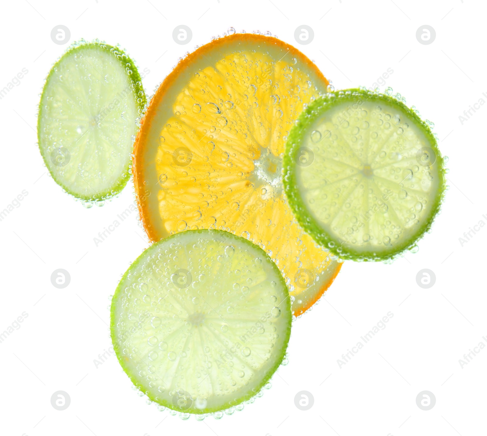 Photo of Slices of citrus fruits in sparkling water on white background