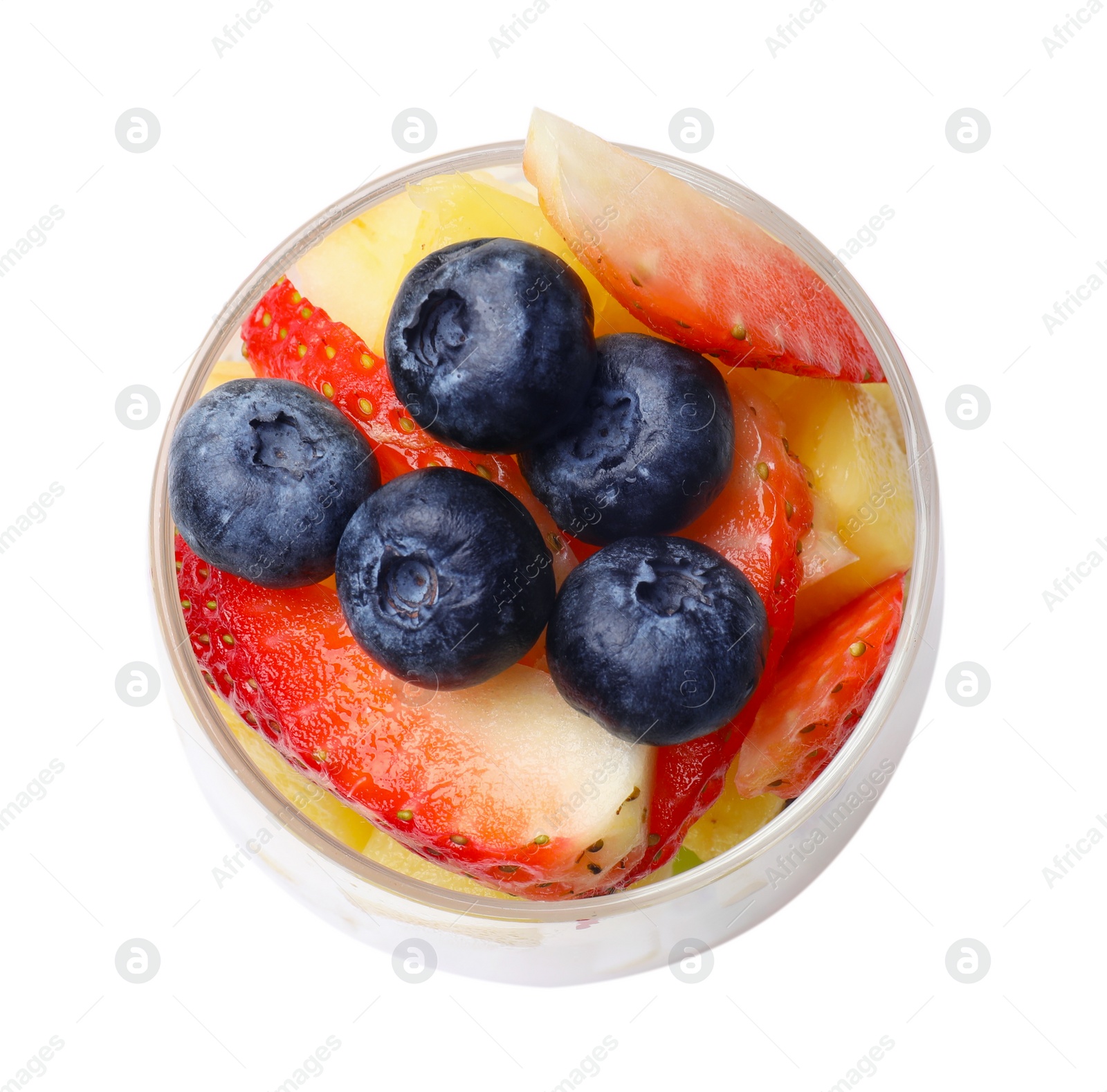 Photo of Delicious fruit salad in glass isolated on white, top view