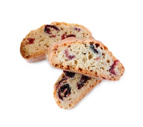 Slices of tasty cantucci with berry on white background, top view. Traditional Italian almond biscuits