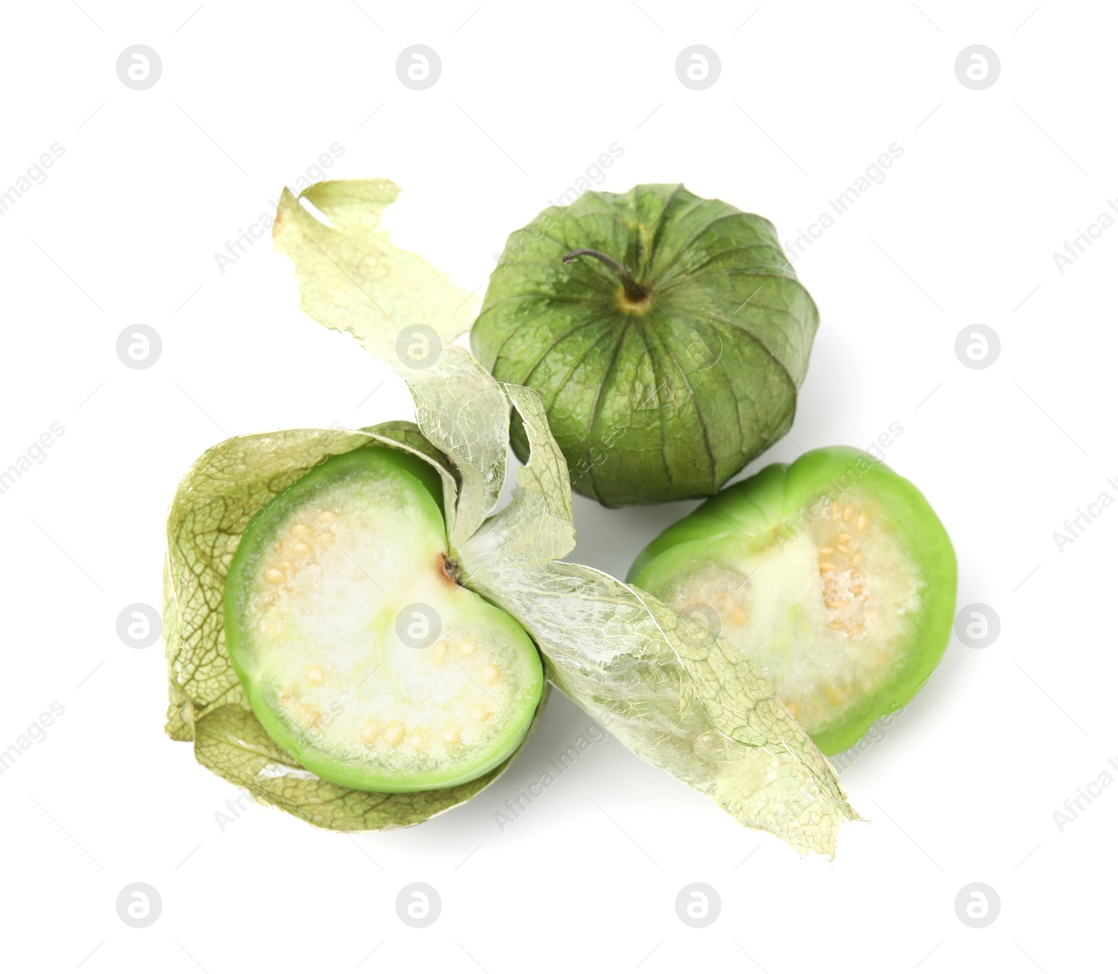 Photo of Fresh green tomatillos with husk isolated on white, top view