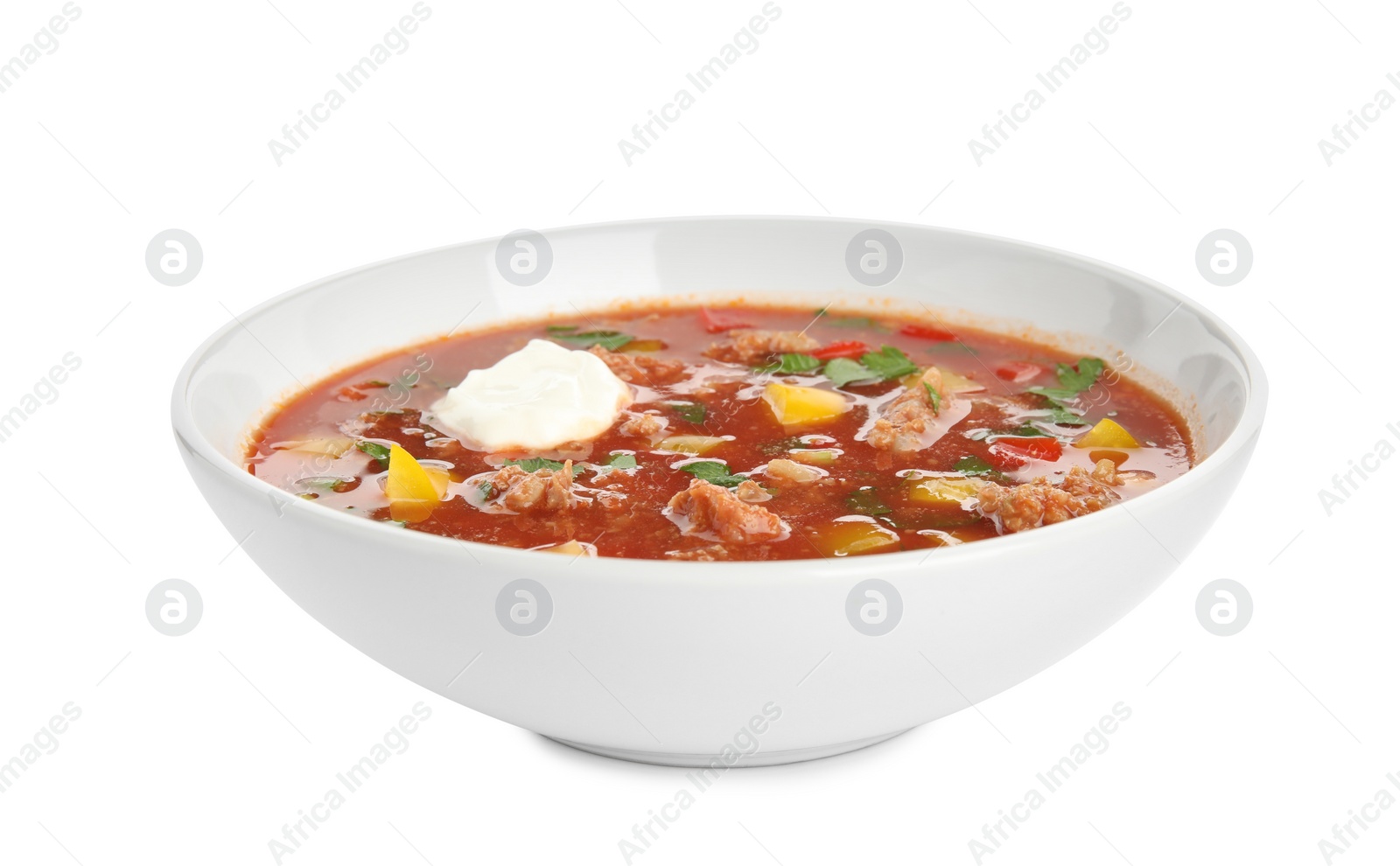 Photo of Bowl of delicious stuffed pepper soup on white background