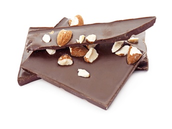 Delicious black chocolate with nuts on white background