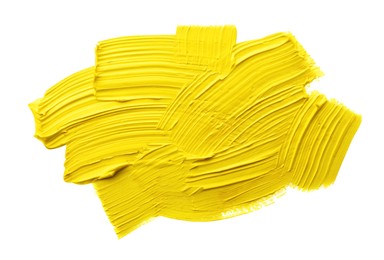 Photo of Yellow oil paint strokes on white background, top view