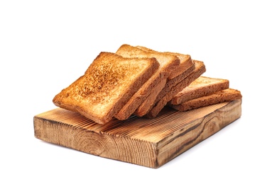 Wooden board with toasted bread on white background