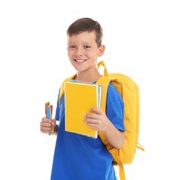 Cute child with school stationery on white background
