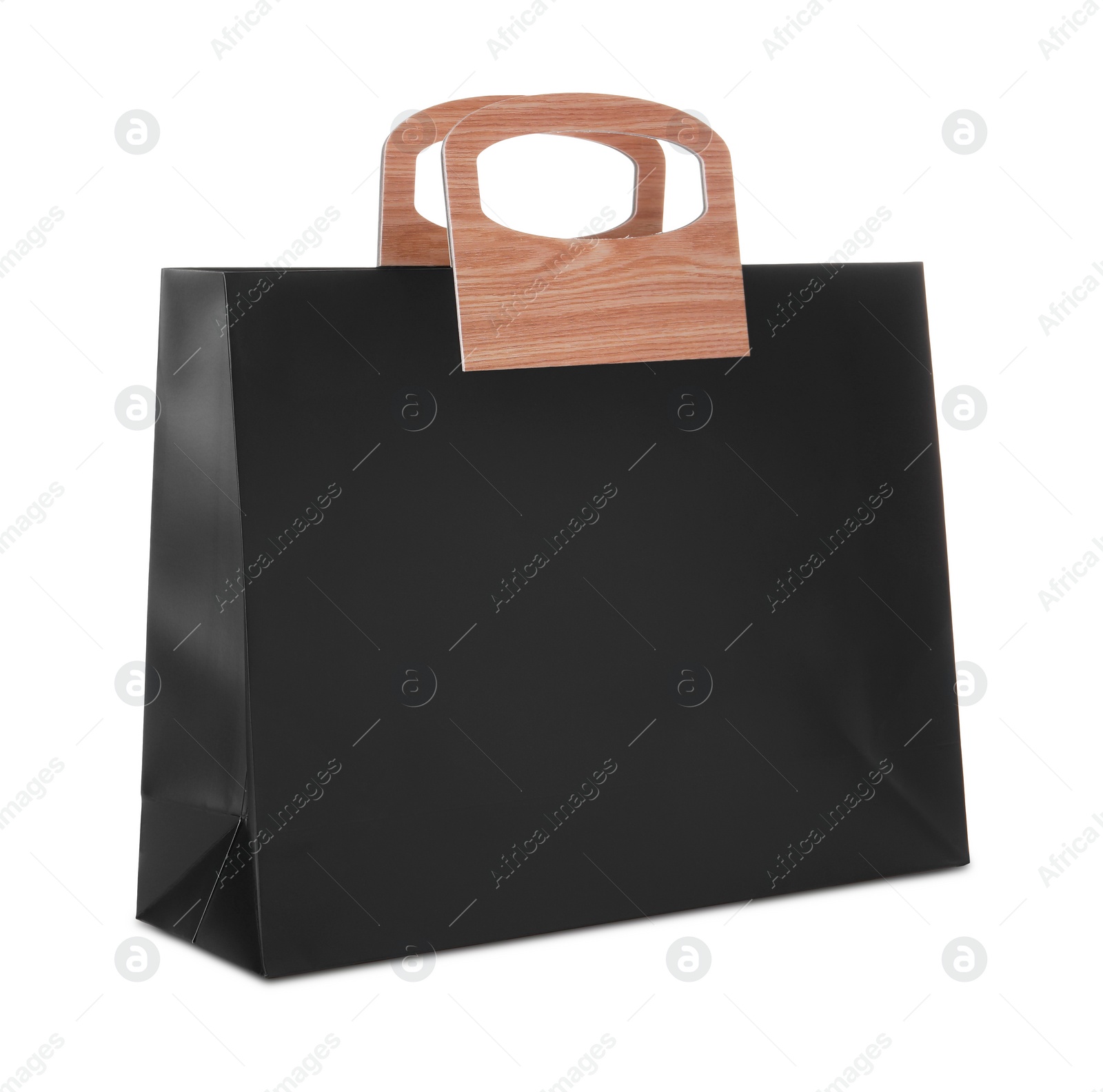 Photo of One black paper bag isolated on white