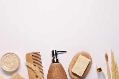 Bath accessories. Different personal care products and dry spikelets on white background, flat lay with space for text