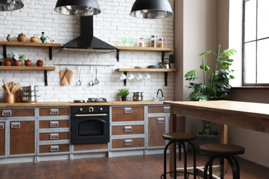 Photo of Beautiful kitchen interior with new stylish furniture