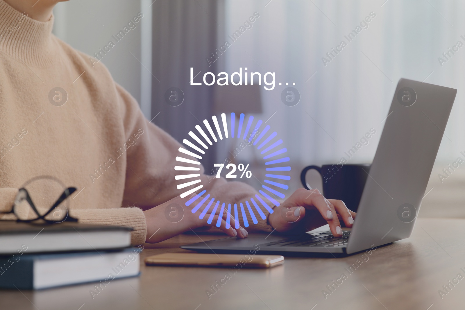 Image of Loading progress. Woman working on laptop at table indoors, closeup