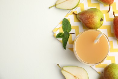 Photo of Tasty pear juice and fruits on white table, flat lay. Space for text