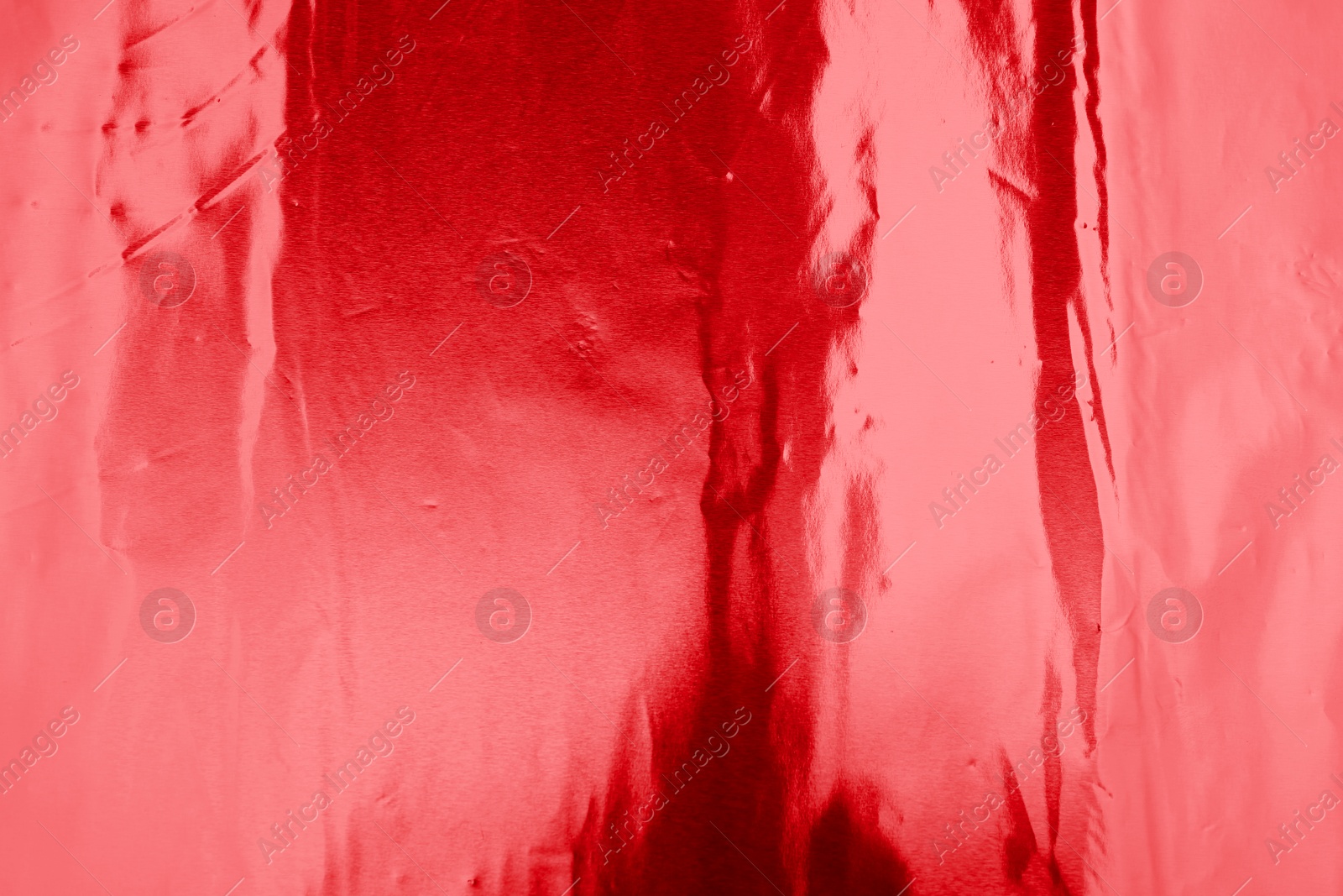 Image of Beautiful red foil as background, top view