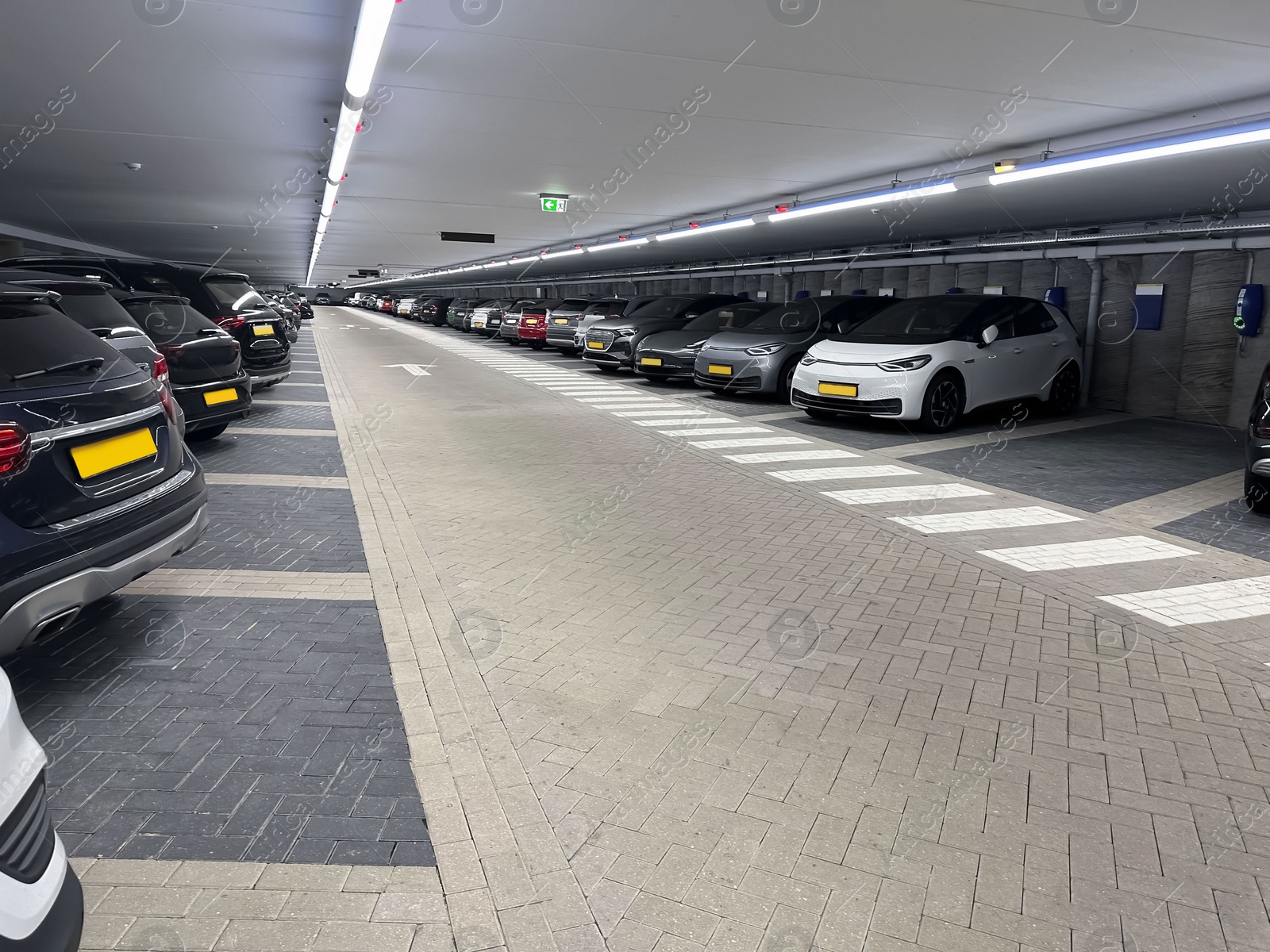 Photo of Many different cars in underground parking garage