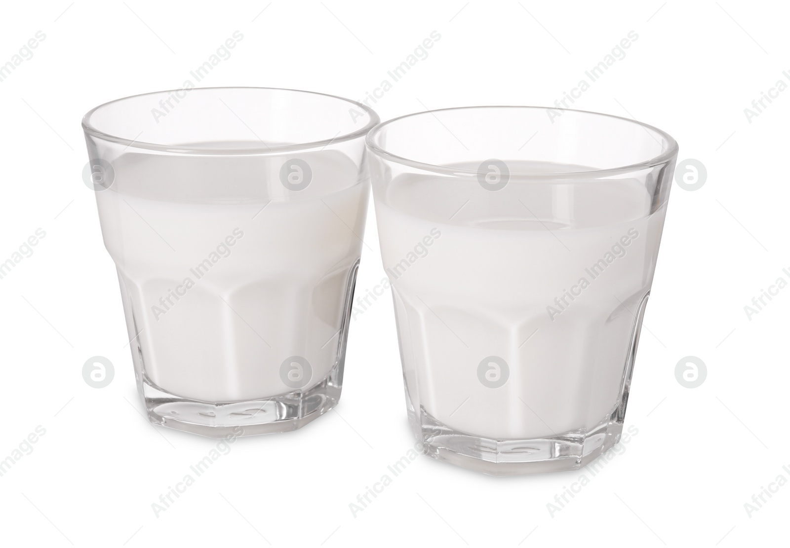 Photo of Glasses of fresh milk isolated on white