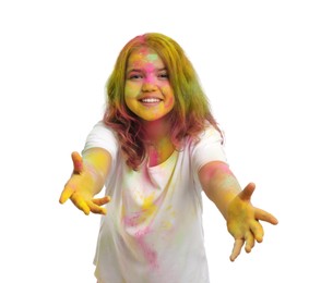 Photo of Teen girl covered with colorful powder dyes on white background. Holi festival celebration