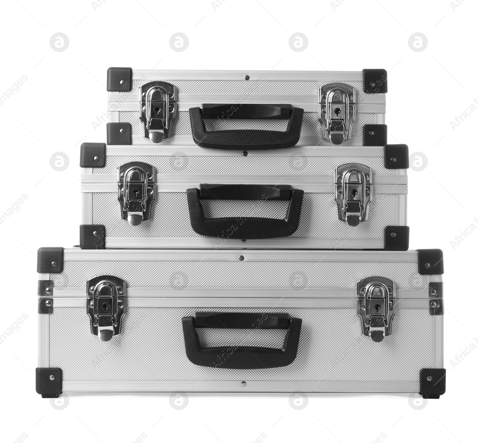 Photo of Set of aluminum hard cases on white background