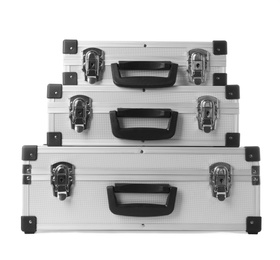 Set of aluminum hard cases on white background