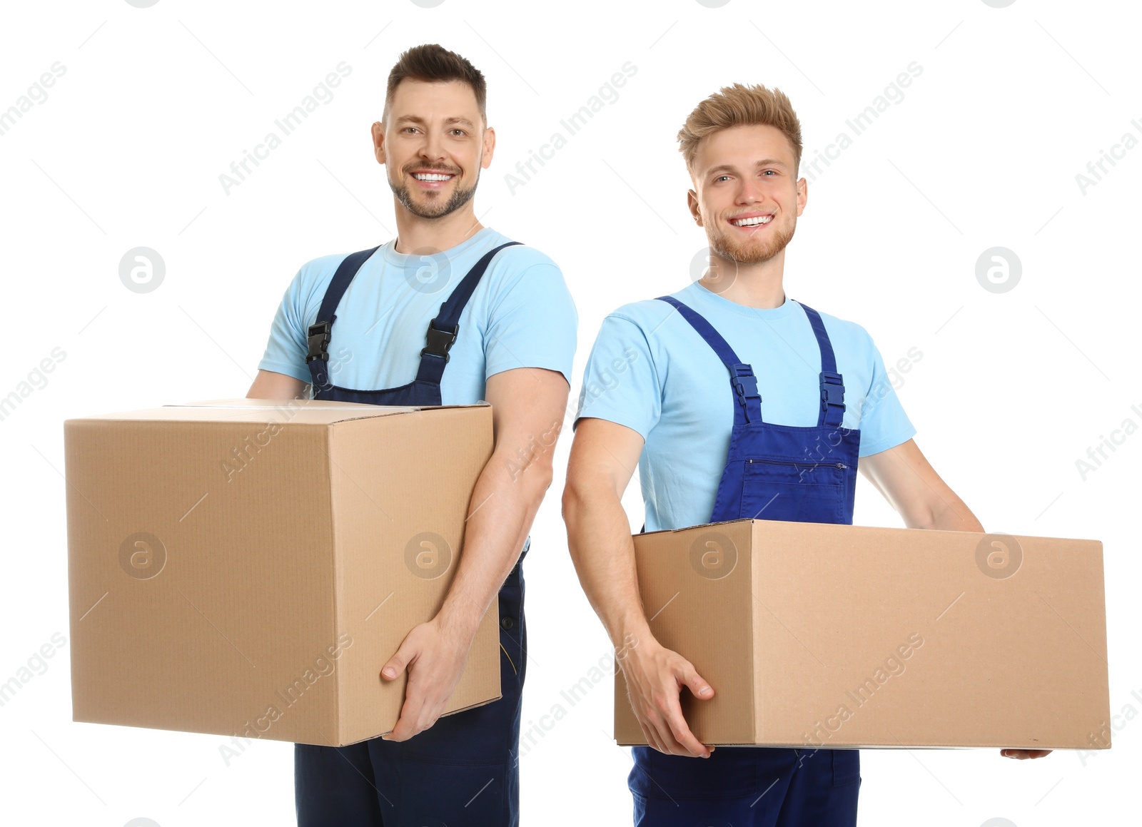 Photo of Portrait of moving service employees with cardboard boxes on white background