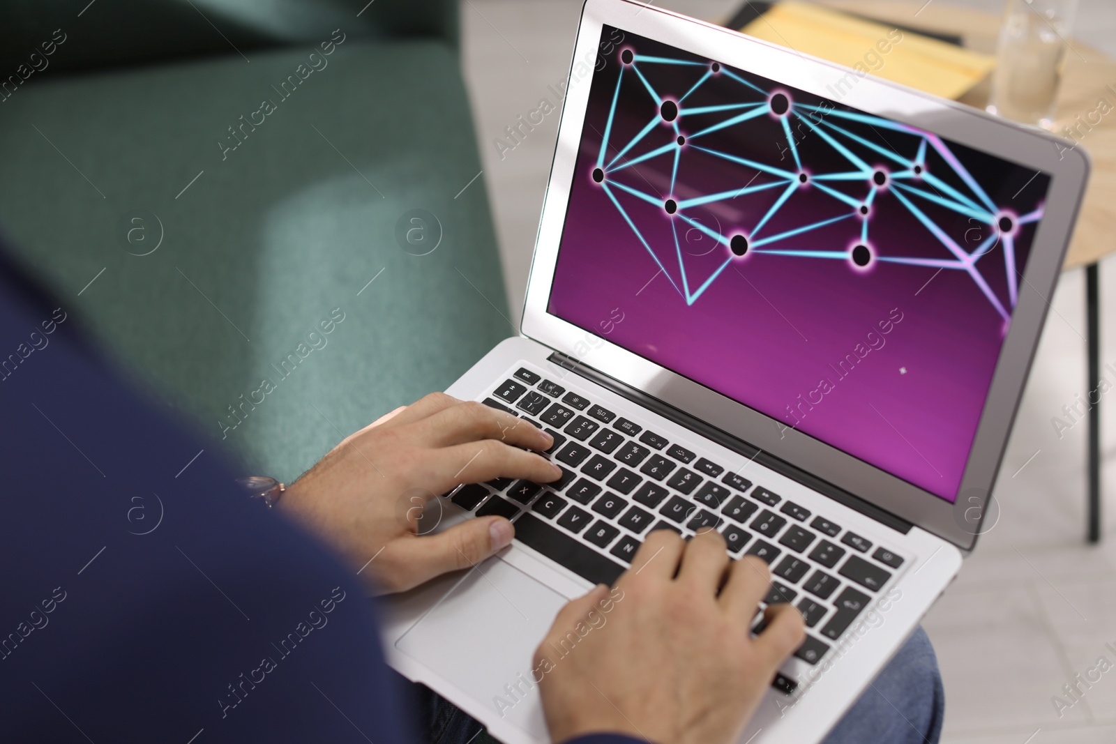 Photo of Businessman working with laptop in office, closeup. Forex trading