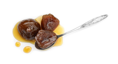 Photo of Tasty sweet fig jam and spoon isolated on white, top view