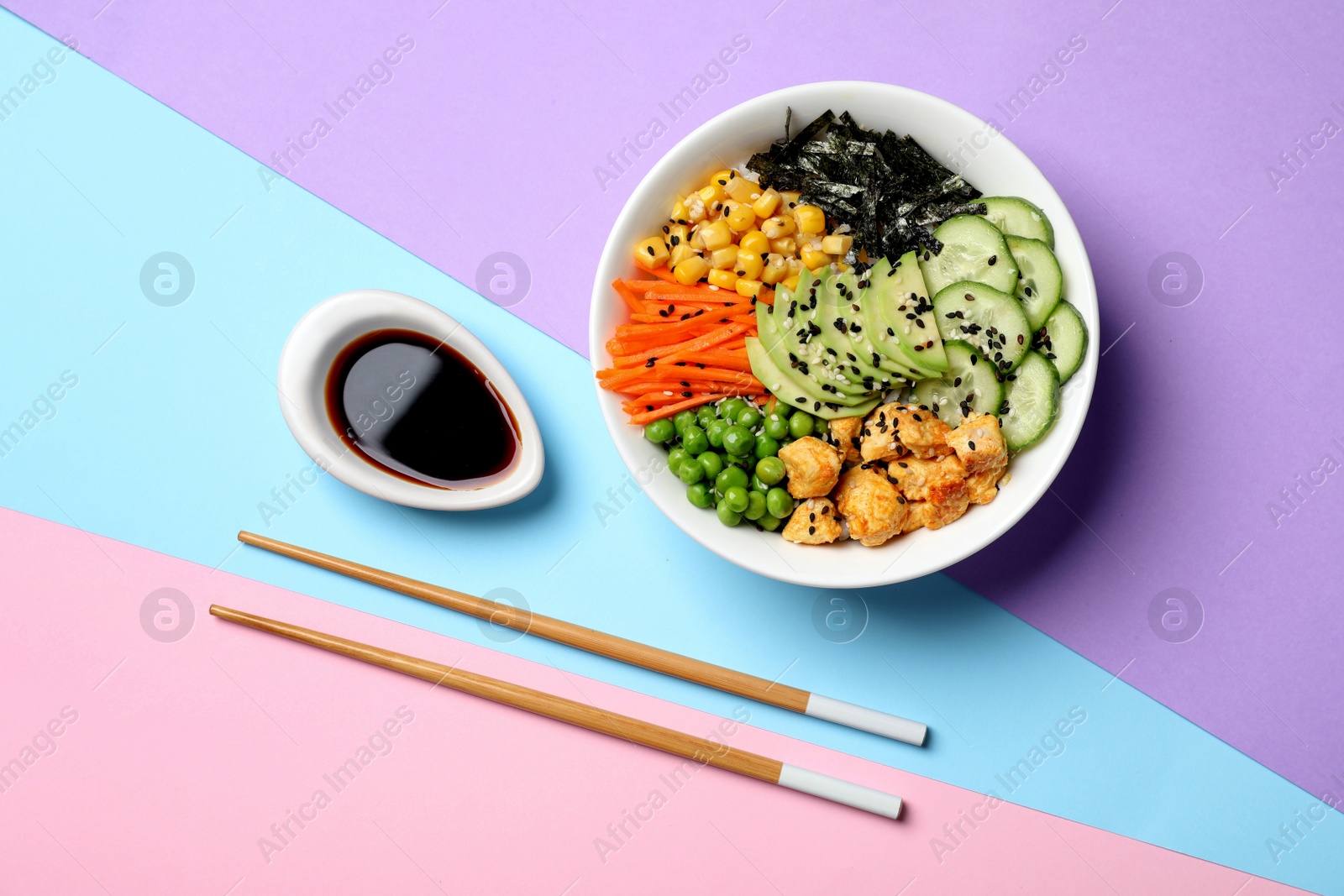 Photo of Delicious salad with chicken and vegetables on color background, flat lay