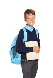 Little boy in stylish school uniform on white background