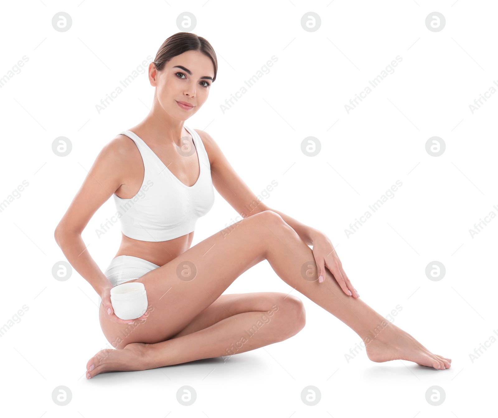 Photo of Young woman with jar of cream on white background. Beauty and body care