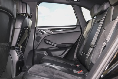 Photo of Inside of modern car with black leather seats