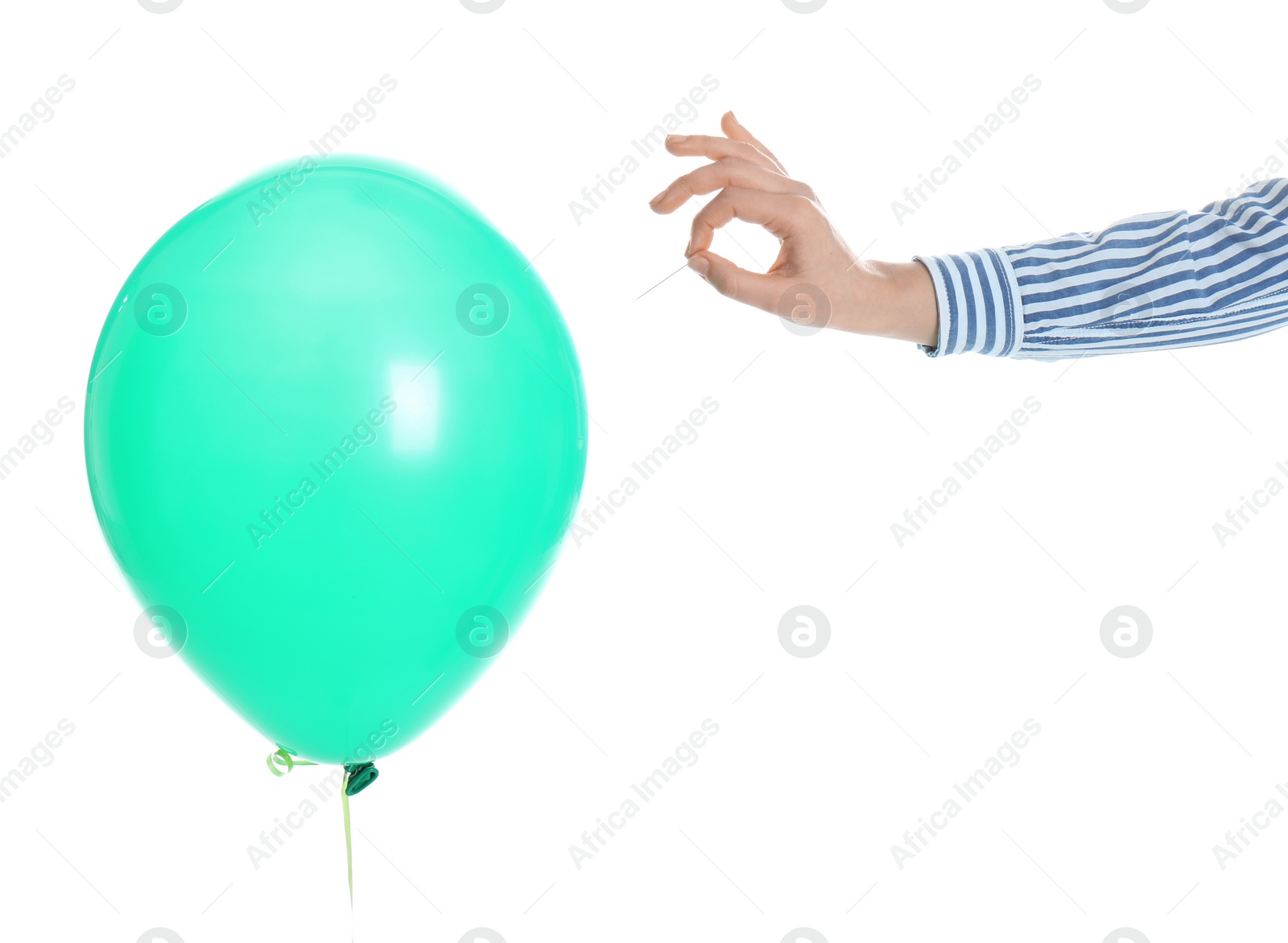 Photo of Woman piercing green balloon on white background, closeup