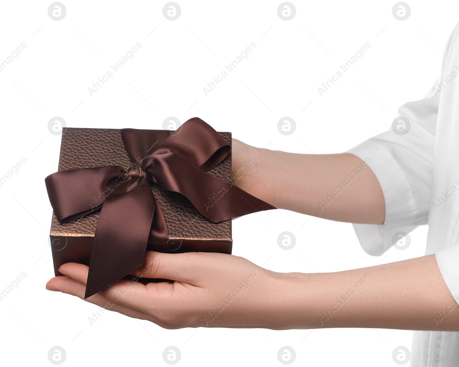 Photo of Doctor holding gift box on white background, closeup. Medical present