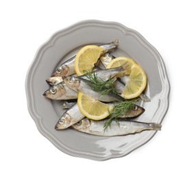 Photo of Fresh raw sprats, dill and cut lemon isolated on white, top view