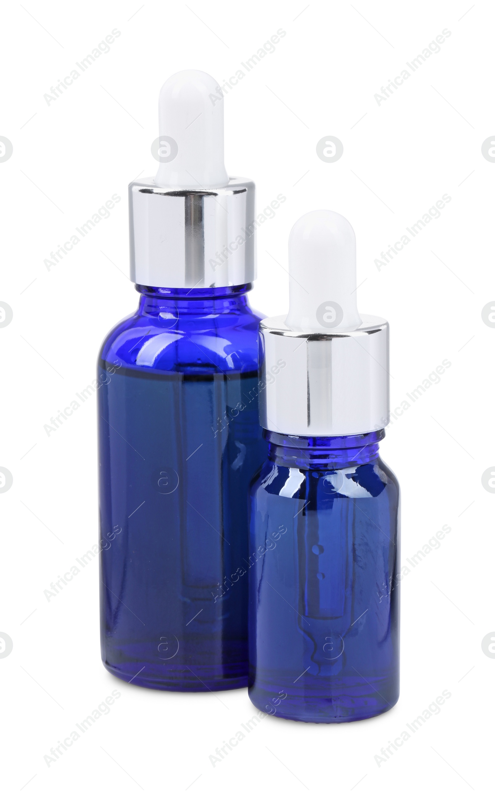 Photo of Blue bottles with tincture isolated on white