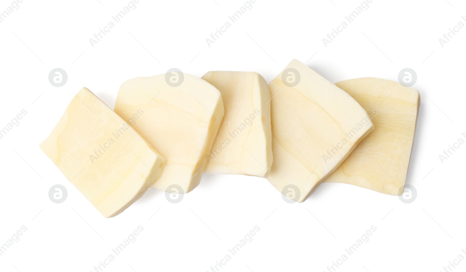 Photo of Tasty cut fresh ripe parsnip on white background, top view