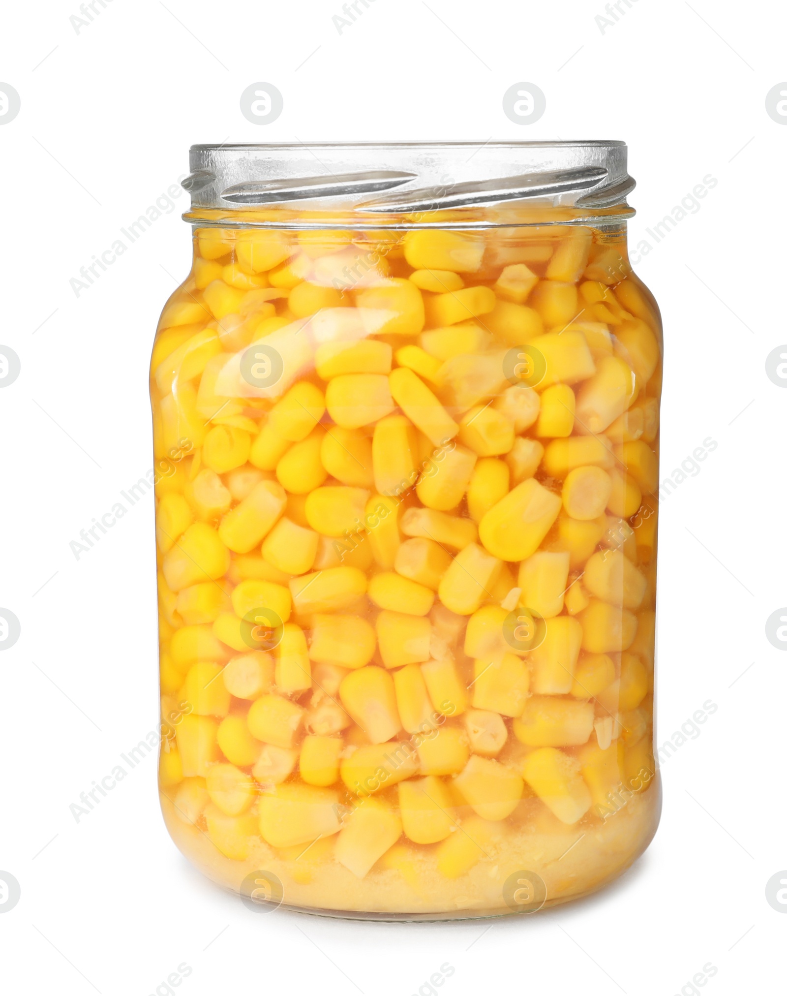 Photo of Glass jar with pickled corn isolated on white