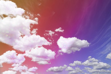 Image of Magic sky with fluffy clouds toned in bright colors