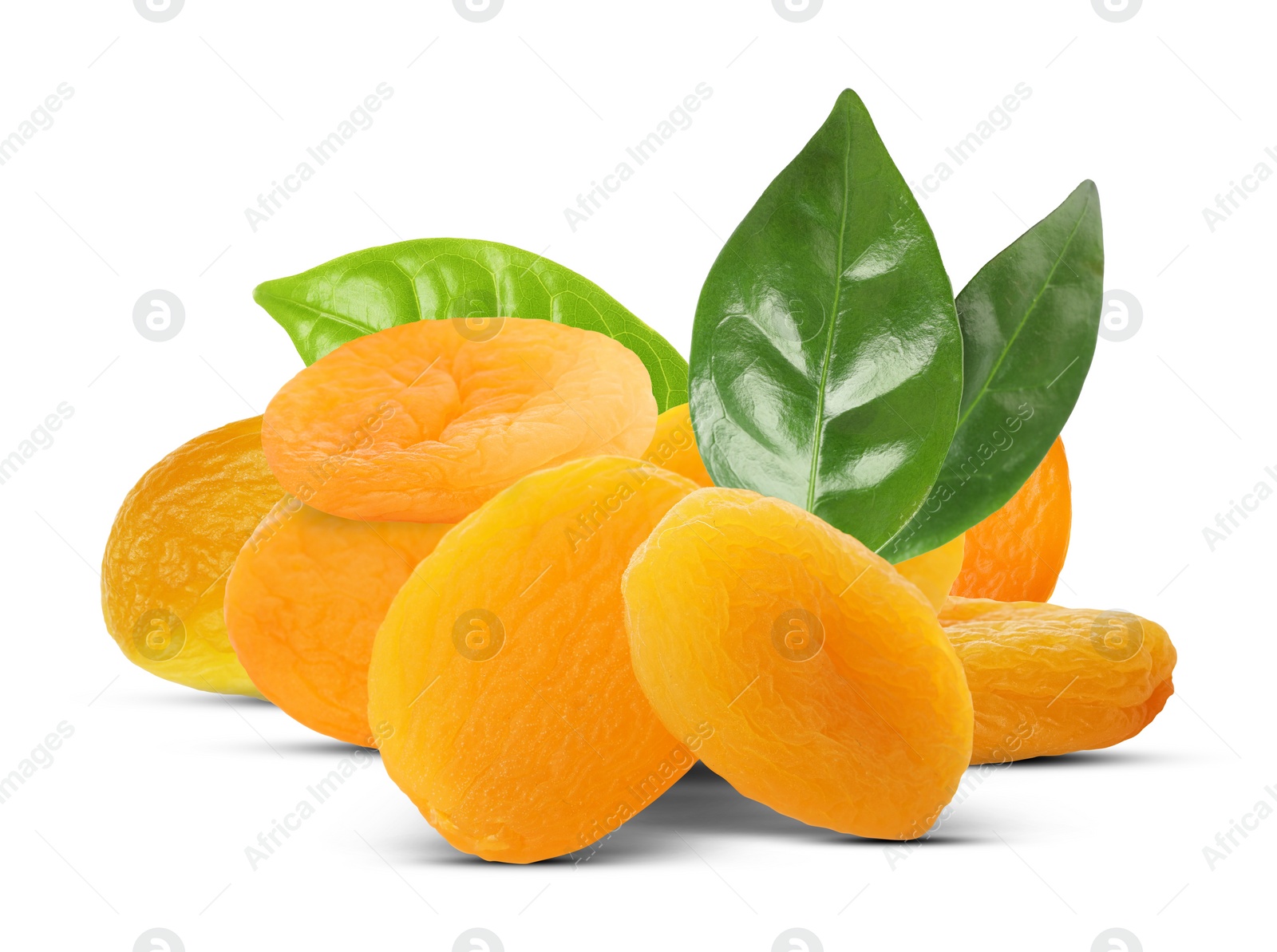 Image of Tasty dried apricots and green leaves on white background