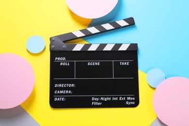 Clapperboard on color background, top view. Film industry