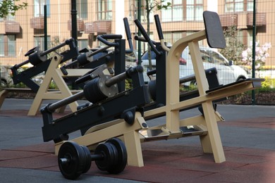 Empty outdoor gym with exercise simulator in residential area