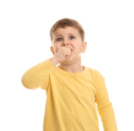 Cute boy suffering from cough on white background