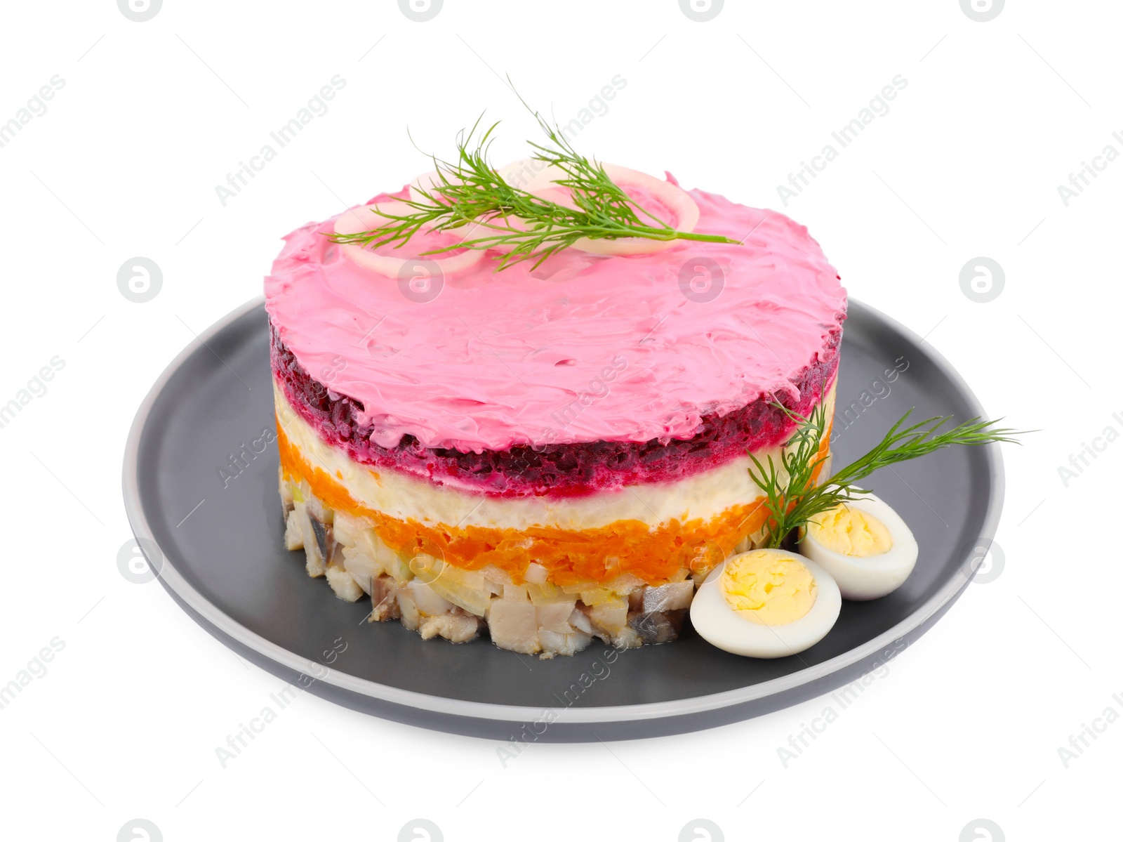 Photo of Herring under fur coat salad isolated on white. Traditional Russian dish