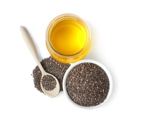 Photo of Composition with jar of chia oil and seeds on white background, top view