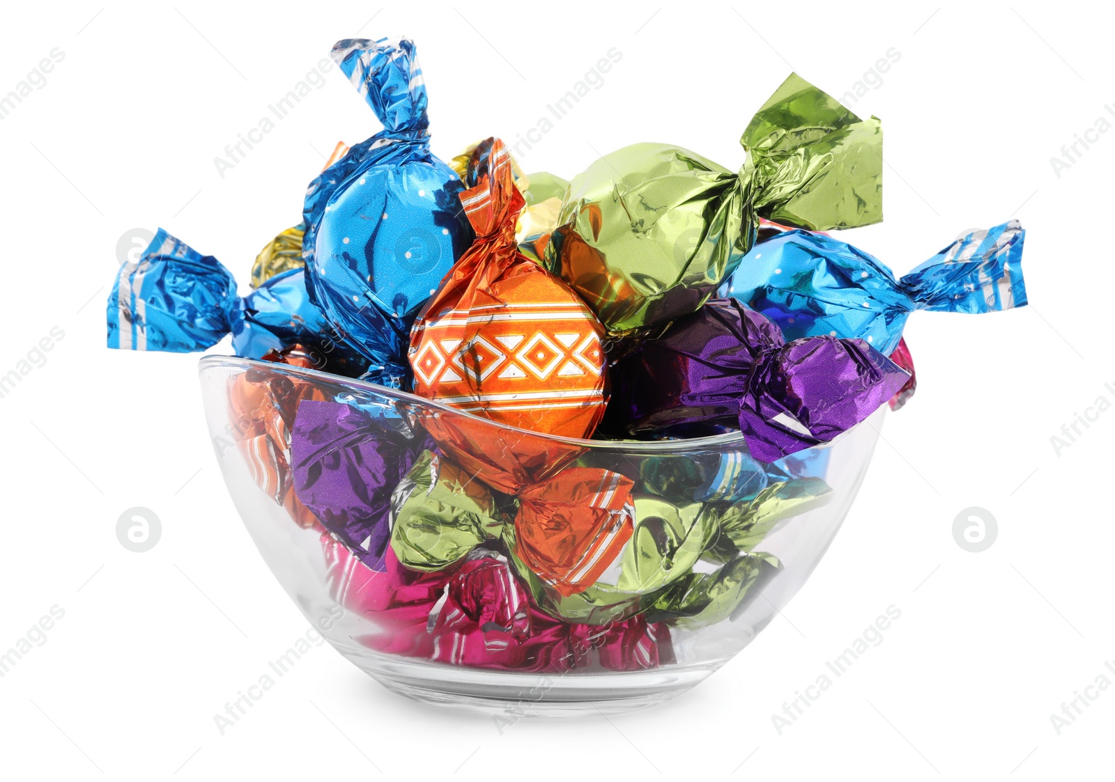 Photo of Bowl with sweet candies in colorful wrappers on white background